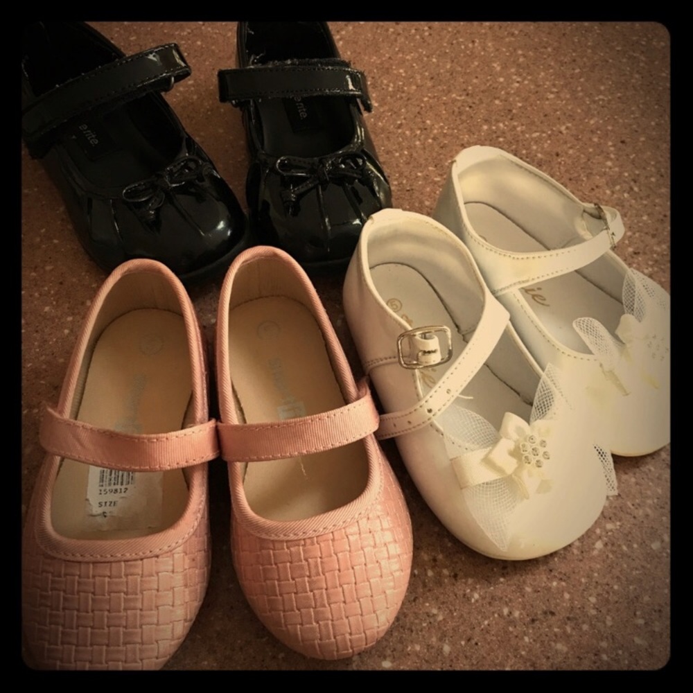 Three pairs of baby girl shoes